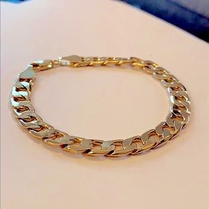 New gold plated Cuban chain bracelet. 7.75” long,